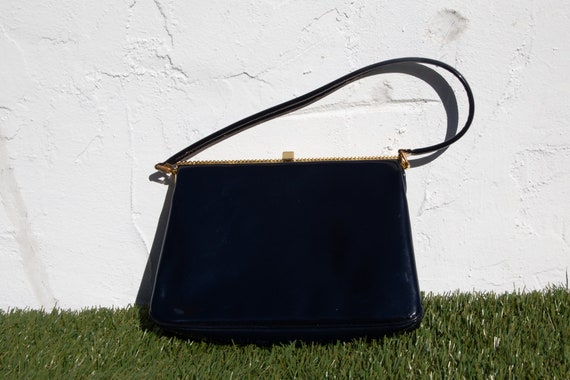 navy patent leather clutch