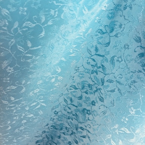 Polyester tone on tone, Lt Blue, 45”  wide, 1/2 yard cuts