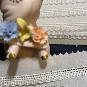 1y  Embroidered edge on  white Batiste, made in Switzerland, 3/4&quot;.