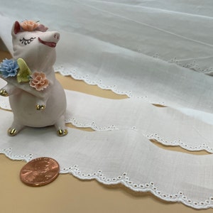 Embroidered edge on  white Batiste, made in Switzerland, 1 1/4”