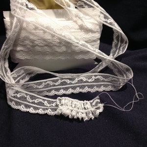 1y, French lace with strings so it can rusch, all cotton,  1  wide, 2 rows of strings, white.