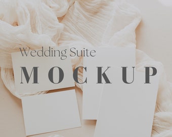May include: Wedding Suite Mockup with three blank white cards on a light beige background with a white sheer fabric draped over the cards. The text "Wedding Suite Mockup" is printed on one of the cards.
