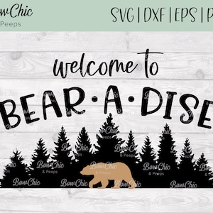 May include: Welcome to Bear-A-Dise, a black and white text graphic with a brown bear silhouette in front of a black silhouette of a forest.