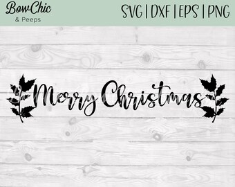 May include: A black digital graphic design featuring the text Merry Christmas in a cursive script font, flanked by two holly leaf sprigs on either side. The design is presented against a light-colored, horizontal wood plank background.