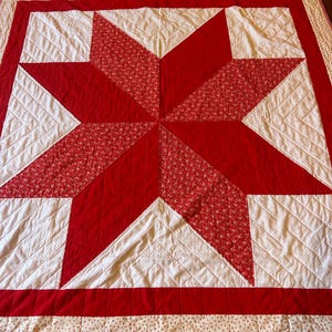Late 20th century hand made summer star quilt