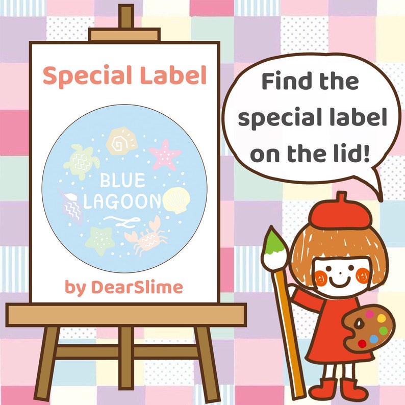 May include: A white easel with a blue and white circle label that says "BLUE LAGOON" with a variety of sea creatures and shells. The text "Special Label" is above the circle and the text "by DearSlime" is below the circle. A cartoon girl with red hair and a red beret is holding a paintbrush and a paint palette. The text "Find the special label on the lid!" is in a speech bubble above the girl.