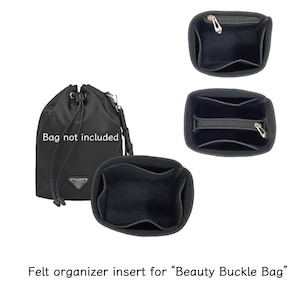 May include: Black felt handbag organiser inserts with multiple compartments and zipped pockets. The image shows the organiser inserts in different views, with a black drawstring bag in the background. Text reads "Bag not included."