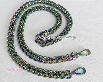 May include: A 17 mm rainbow purse chain with two lobster clasps. The chain is made of metal and has a rainbow finish. The chain is 0.7 inches (17 mm) wide.