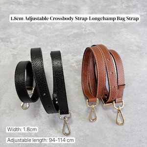 May include: Two adjustable crossbody bag straps. One is black, the other is brown. Both straps are 1.8cm wide and have a length that adjusts from 37 to 44.9 inches. Each strap has gold-colored metal clasps for attachment.