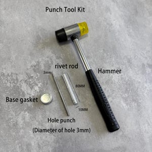 May include: A punch tool kit with a hammer, rivet rod, hole punch, and base gasket. The hammer has a black handle and a silver head with a yellow and black striking surface. The hole punch diameter is 3mm. The rivet rod is 80mm long.