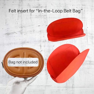 May include: A red felt insert for an In-the-Loop Belt Bag, shown in two views. The image includes the text Felt insert for In-the-Loop Belt Bag and Bag not included. A tan oval bag is also visible, held by a hand wearing a white glove.