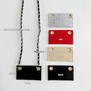 May include: A black felt pouch with a silver chain strap. The pouch is 5.8 cm by 10 cm. The image shows the pouch in black, grey, red, khaki, and black.