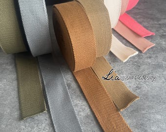 Puede incluir: Surtido de cintas de algodón de 3,8 cm de ancho en varios colores, incluyendo gris, marrón, verde, beige y rosa. La cinta es un tejido tejido con una superficie texturizada.