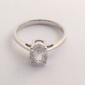 Vintage Cubic Zirconia Ring With Oval Solitaire Gem in a Basket Set and Tapered Shank. Hallmarked Sterling Silver. Engagement Ring