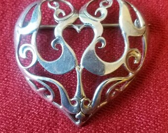 very nice ornate sterling silver pin