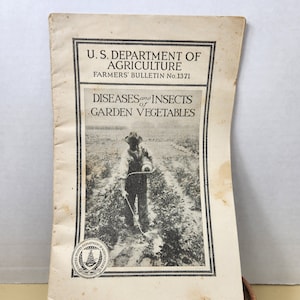 May include: A black and white photo of a farmer spraying a field of crops. The image is from a U.S. Department of Agriculture Farmers' Bulletin No. 1371, titled "Diseases and Insects of Garden Vegetables".