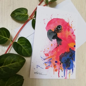 Carte perroquet rouge à l'aquarelle