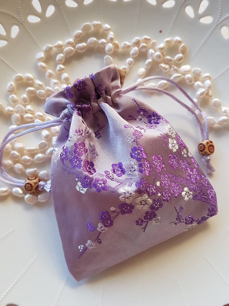 ROUND DRAWSTRING POUCH WITH BEADING LUXE NAVY main image 1