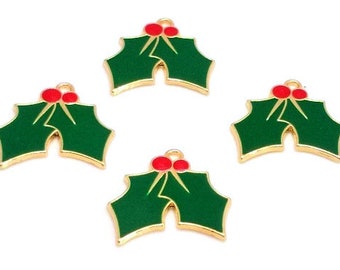 May include: Four gold-colored metal charms shaped like holly leaves with red berries. The charms are perfect for adding a festive touch to jewelry, crafts, and other projects.