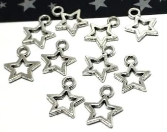 May include: Ten silver-toned star-shaped charms with a hole at the top for attaching to jewelry or other crafts.
