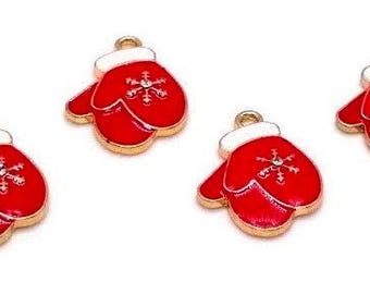 May include: Four small metal charms shaped like mittens, each featuring a vibrant red enamel finish, a white cuff, and a central snowflake design accented with a tiny clear rhinestone. Each charm includes a small gold-toned metal loop at the top.
