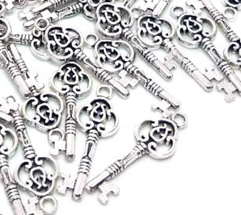 50 Silver Key Charms Charms in Bulk Skeleton Key Lead Etsy