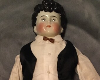 male porcelain doll