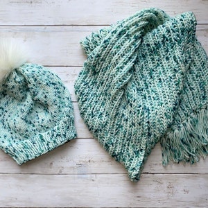 hand knitted hat and ribbed scarf set with speckled green over white with white removable pompom.