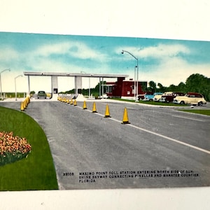 Postal de San Petersburgo, Florida. Estación de peaje de Maximo Point. El lado norte de Sunshine Skyway conecta los condados de Pinellas y Manatee.