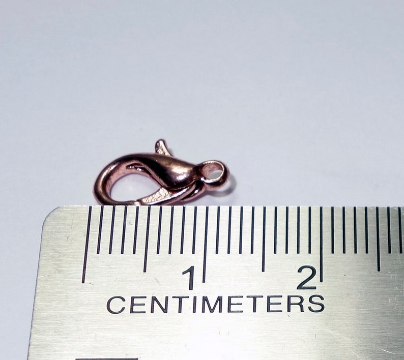 The price is for 25 lobster clasps Lead free and nickel safe 13MM X 7MM 25 GOLD ROSE LOBSTER Clasps Loop 2MM