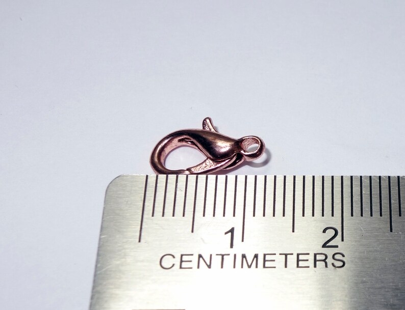 The price is for 25 lobster clasps Lead free and nickel safe 13MM X 7MM 25 GOLD ROSE LOBSTER Clasps Loop 2MM