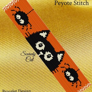 May include: A PDF pattern for a peyote stitch bracelet featuring a black cat with white eyes and a "Scaredy Cat" text label. The bracelet is orange with black and white beads.