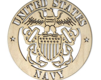 May include: A wooden round sign with the United States Navy seal. The seal features an eagle with outstretched wings, a shield with 13 stripes and 50 stars, and two anchors. The words "United States Navy" are written around the seal.