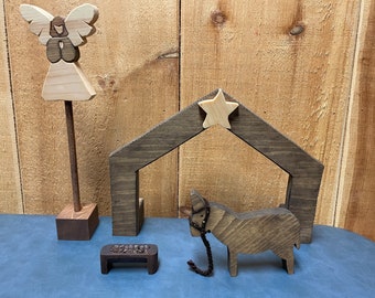 10 Piece Nativity Set Upgrade You get a Stable, Angel, Donkey and Manger. Shipping included in price