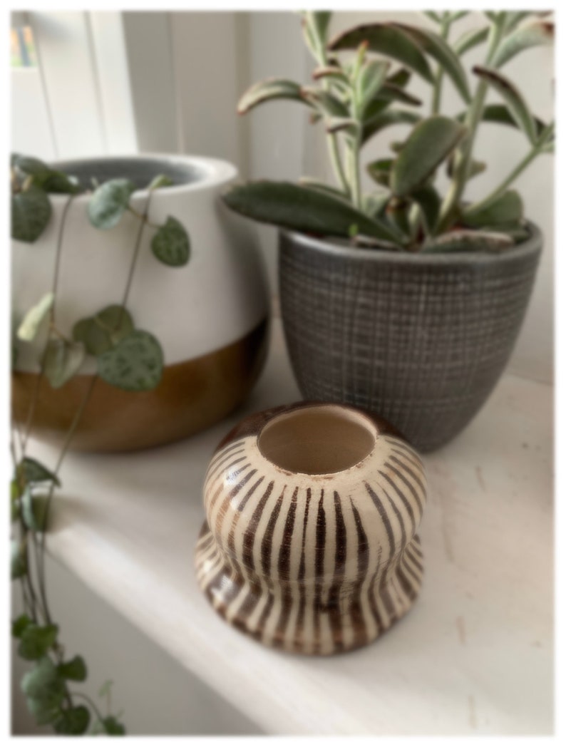 Small hand thrown stonewear ceramic vase in chocolate brown and striped pattern