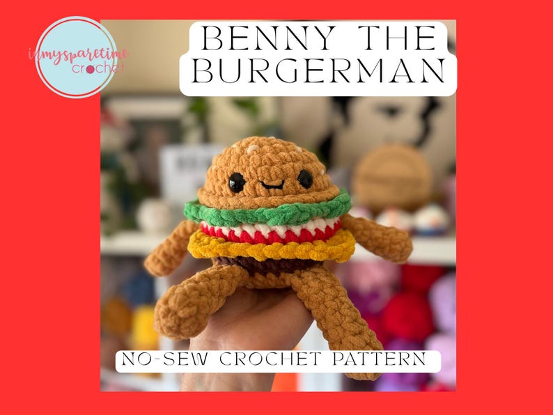 May include: A handmade crochet burger toy with a smiling face, arms, and legs. The burger features a brown bun, green lettuce, yellow cheese, and a brown patty. The image includes the text "Benny the Burgerman" and "No-Sew Crochet Pattern".