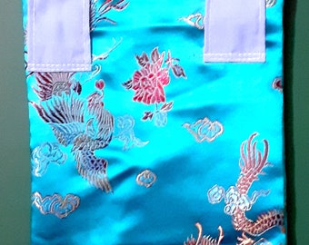 Catheter leg bag cover . Oriental design. Turquoise colour