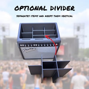 May include: A gray, 3D-printed organizer with dividers, designed to resemble a vintage amplifier. The text "OPTIONAL DIVIDER" and "SEPARATES ITEMS AND KEEPS THEM VERTICAL" are displayed above the organizer. The organizer is shown with a separate divider.