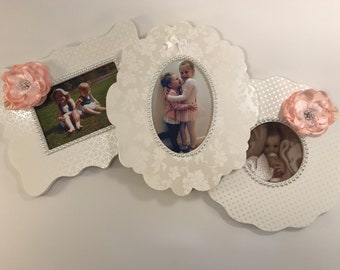 Set of three white pearl picture frames-