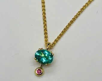 Apatite pendant with small tourmalines