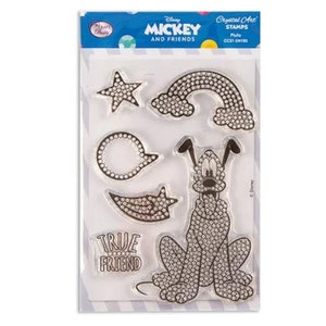 May include: A set of six clear crystal stamps featuring Mickey Mouse and friends. The stamps include a star, a rainbow, a circle, a speech bubble, a shooting star, and Pluto. The stamps are all covered in small, clear crystals.