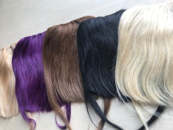 human hair clip on