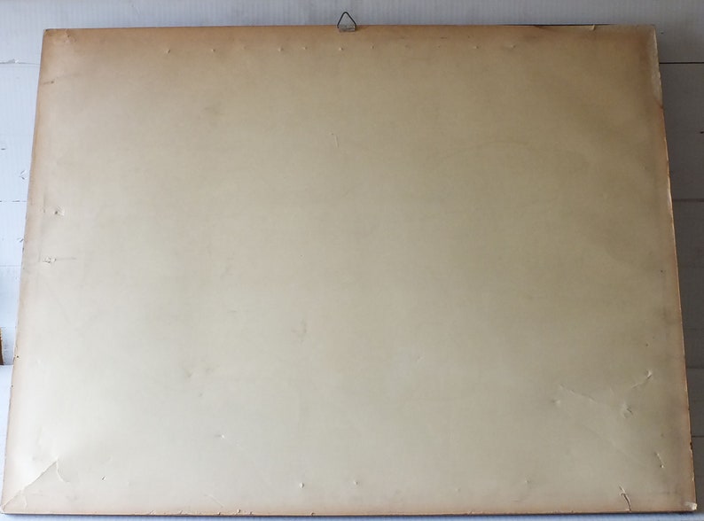 May include: A plain, off-white picture frame with a light brown wooden border. The frame is empty and ready to be filled with a picture or artwork.