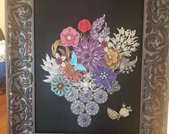 Vintage and modern jewelry art framed. Beautiful floral bouquet