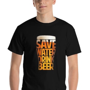 May include: A black t-shirt with a graphic of a beer glass. The text "SAVE WATER DRINK BEER" is printed on the glass.