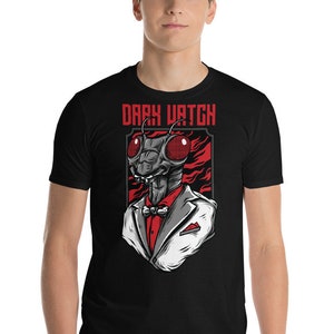 May include: A black t-shirt with a graphic of a mantis wearing a tuxedo and bow tie. The text "DARK WATCH" is printed above the graphic.