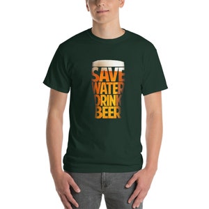 May include: A dark green t-shirt with a graphic of a beer glass that says "Save Water Drink Beer" in a yellow and orange font.