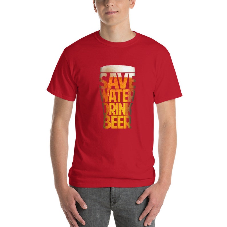 May include: Red t-shirt with a graphic of a beer glass with the text "SAVE WATER DRINK BEER" printed on it.