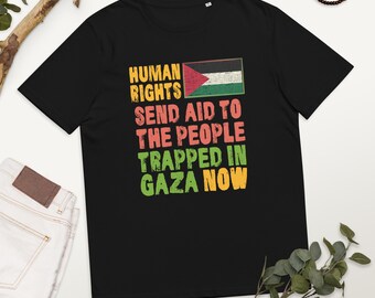 May include: Black t-shirt with a Palestinian flag and the text "Human Rights Send Aid to the People Trapped in Gaza Now".