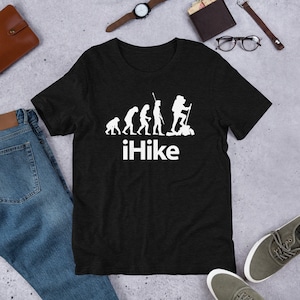 May include: Black t-shirt with a white graphic of the evolution of man, ending with a hiker. The text "iHike" is below the graphic.